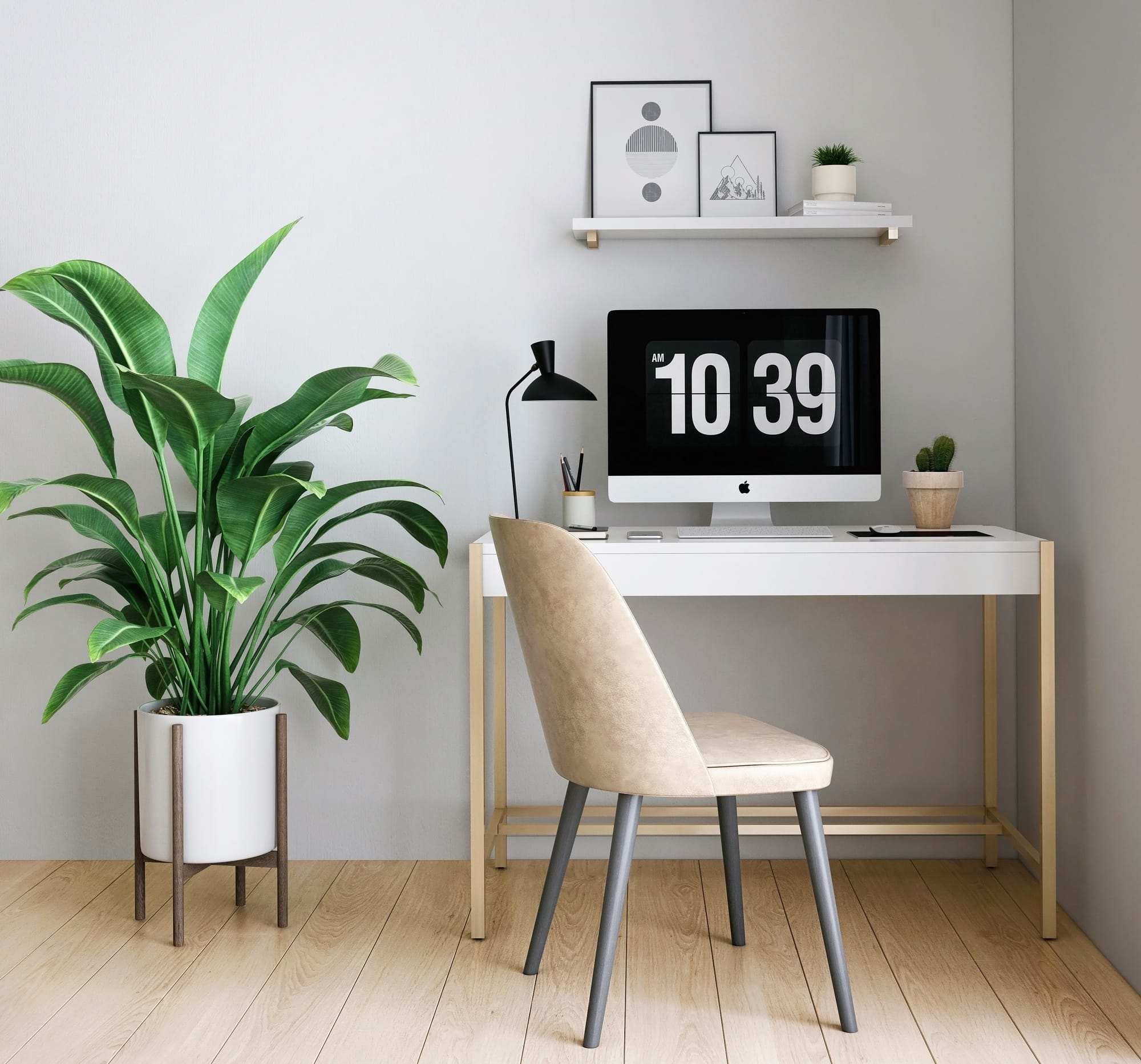 A simple bedroom with a desk and plant