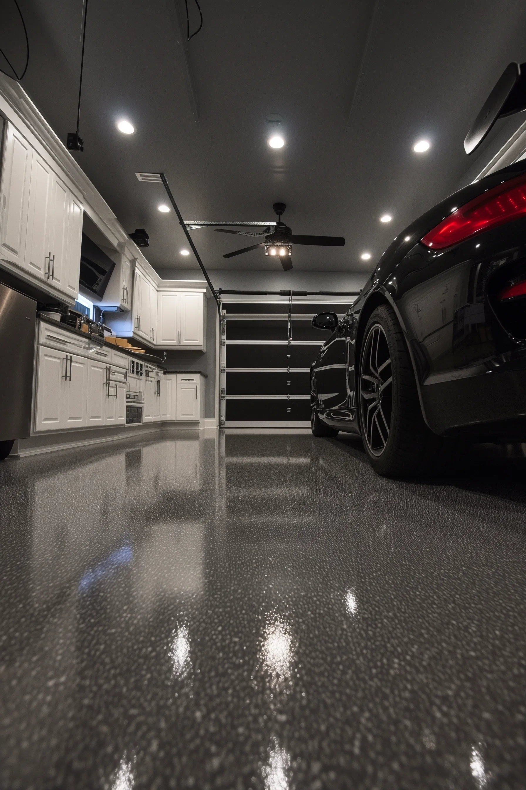 garage floor stain with black car in a garage