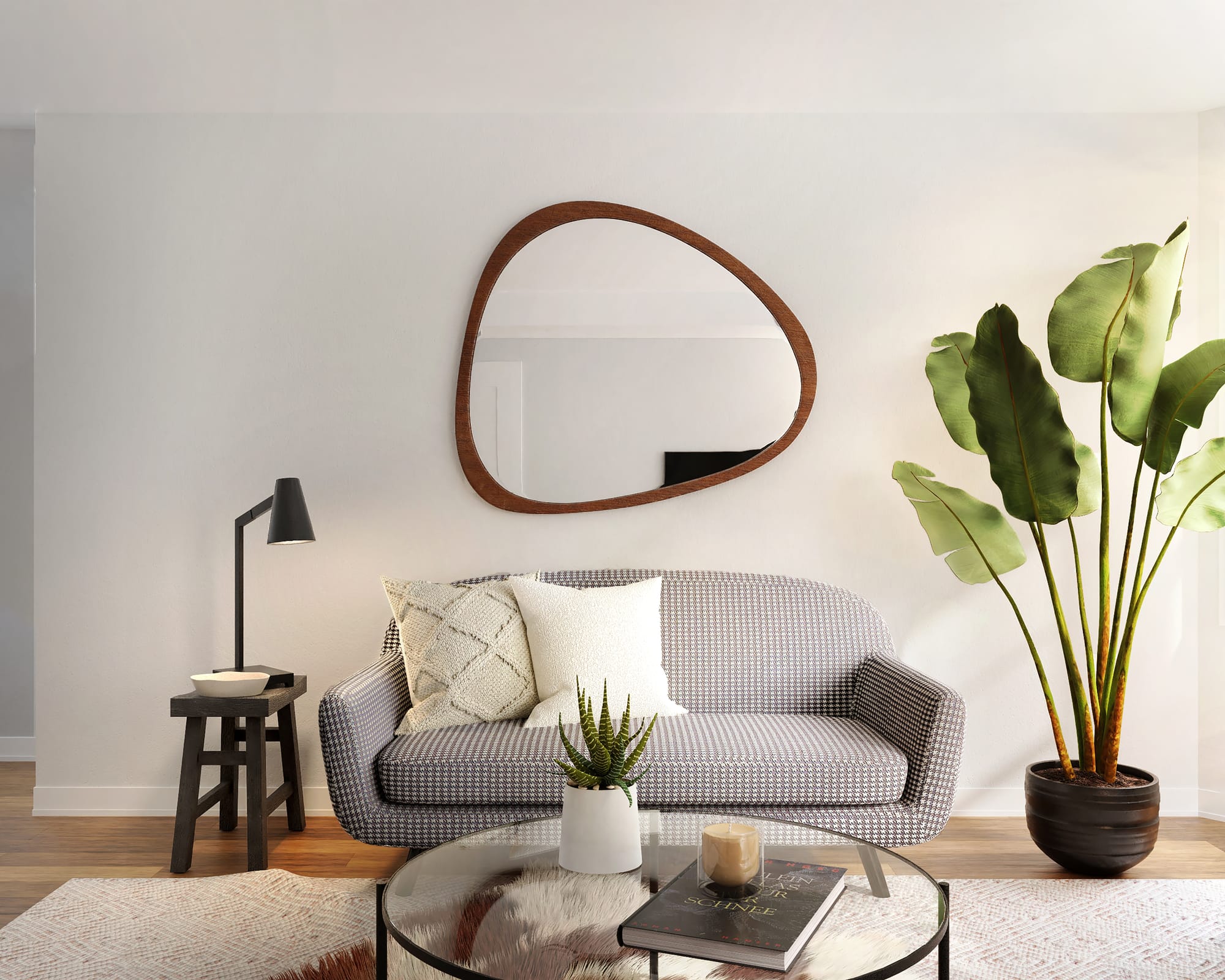 A living room with a funky mirror and plant